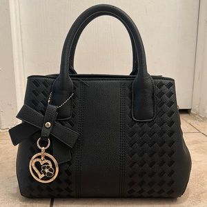 Women’s black purse.
